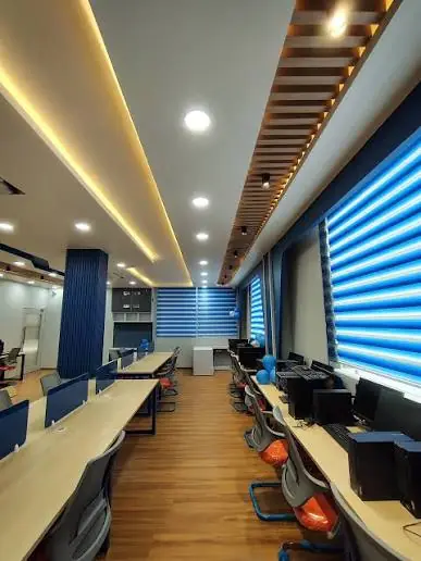 Rows of developer workstations in the Apex DMIT office